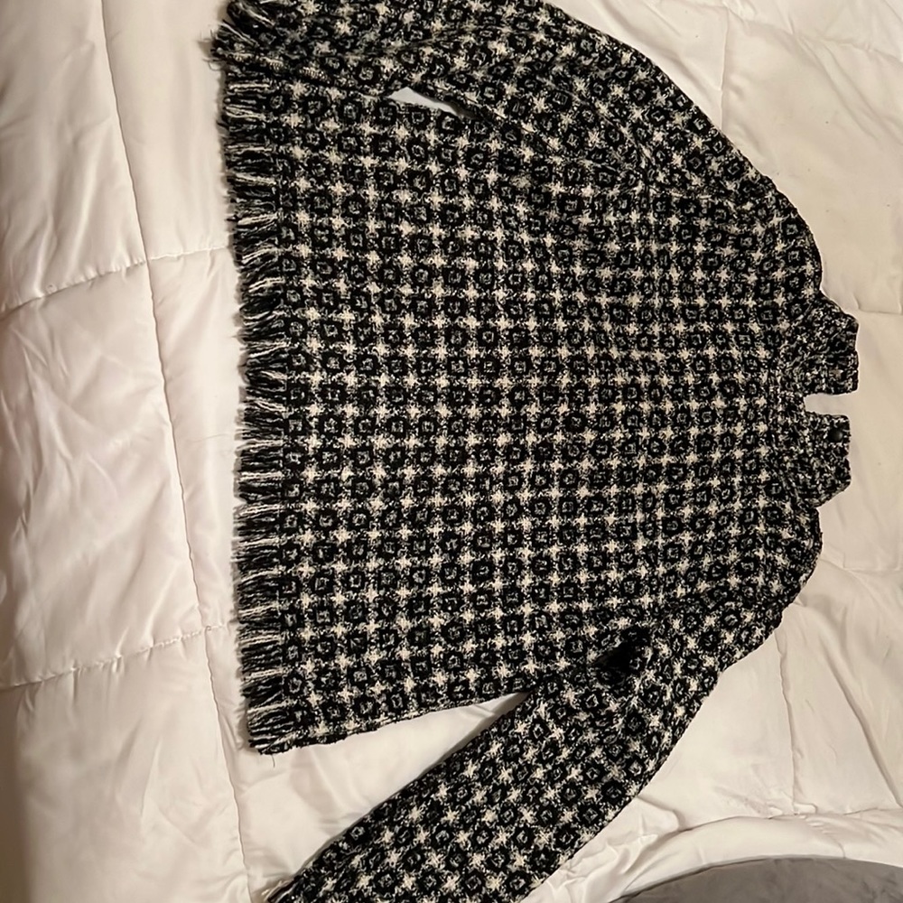 White and black checkered blouse